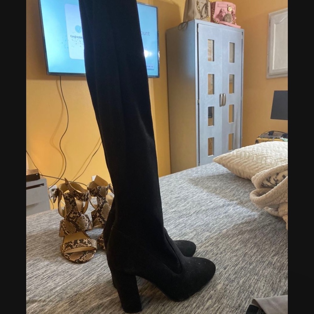 Black gorgeous thigh high boots from Aldo